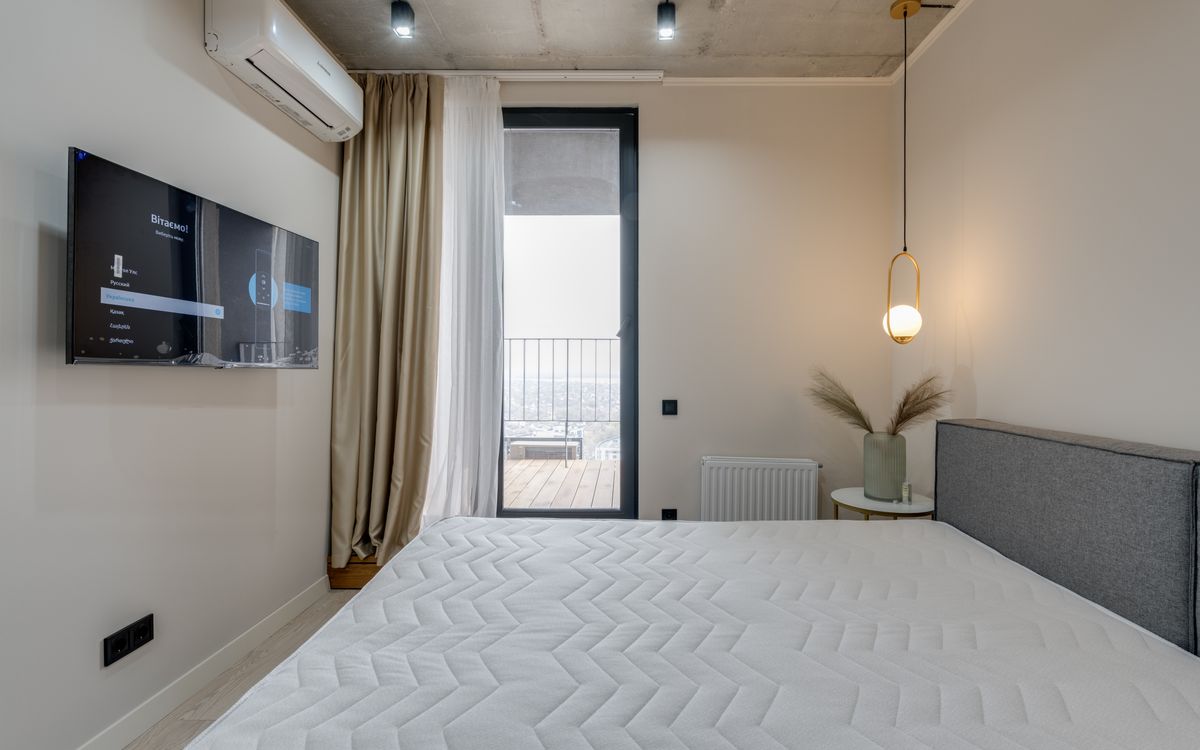 Aménager une chambre de 9 m² en longueur : plan et astuces